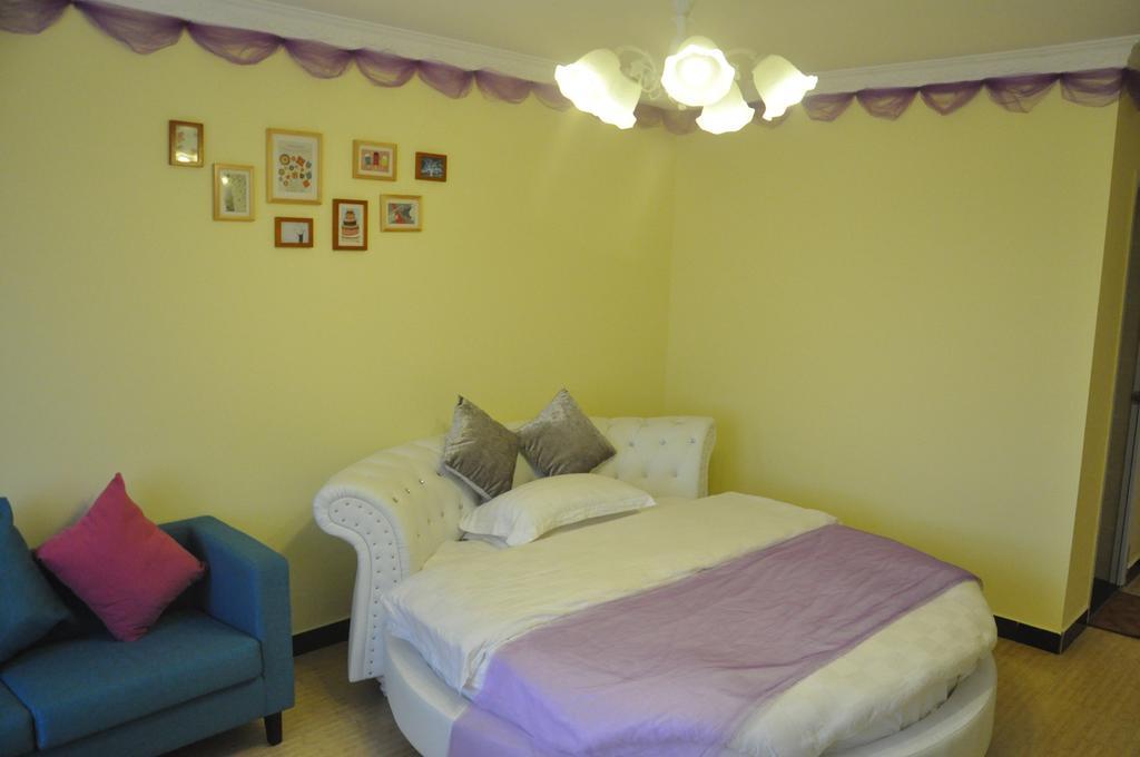 Qq Inn City Center Branch Zhangjiajie Quarto foto